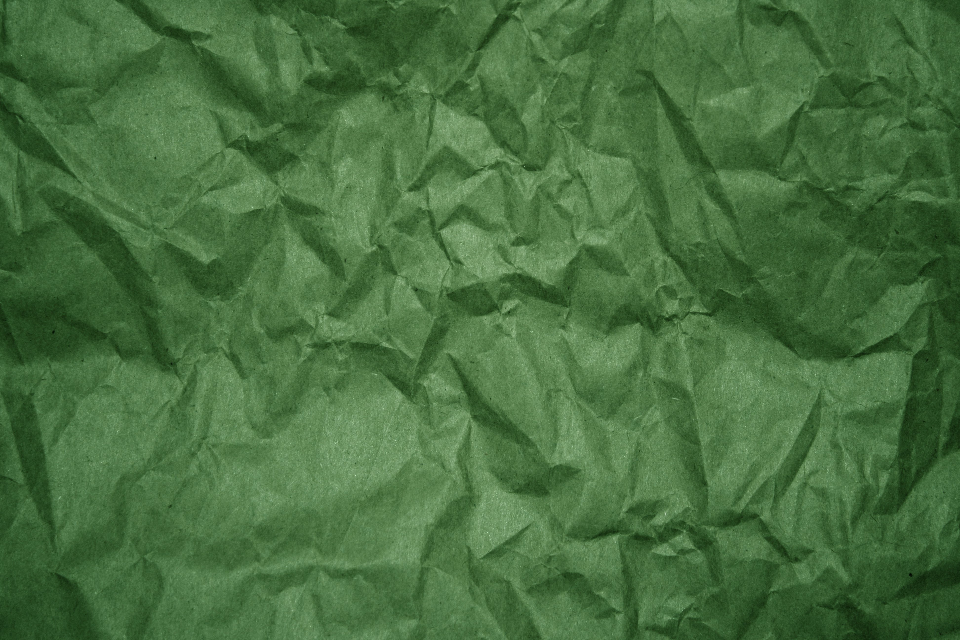 Crumpled Green Paper Texture Background Stock Photo, Picture and