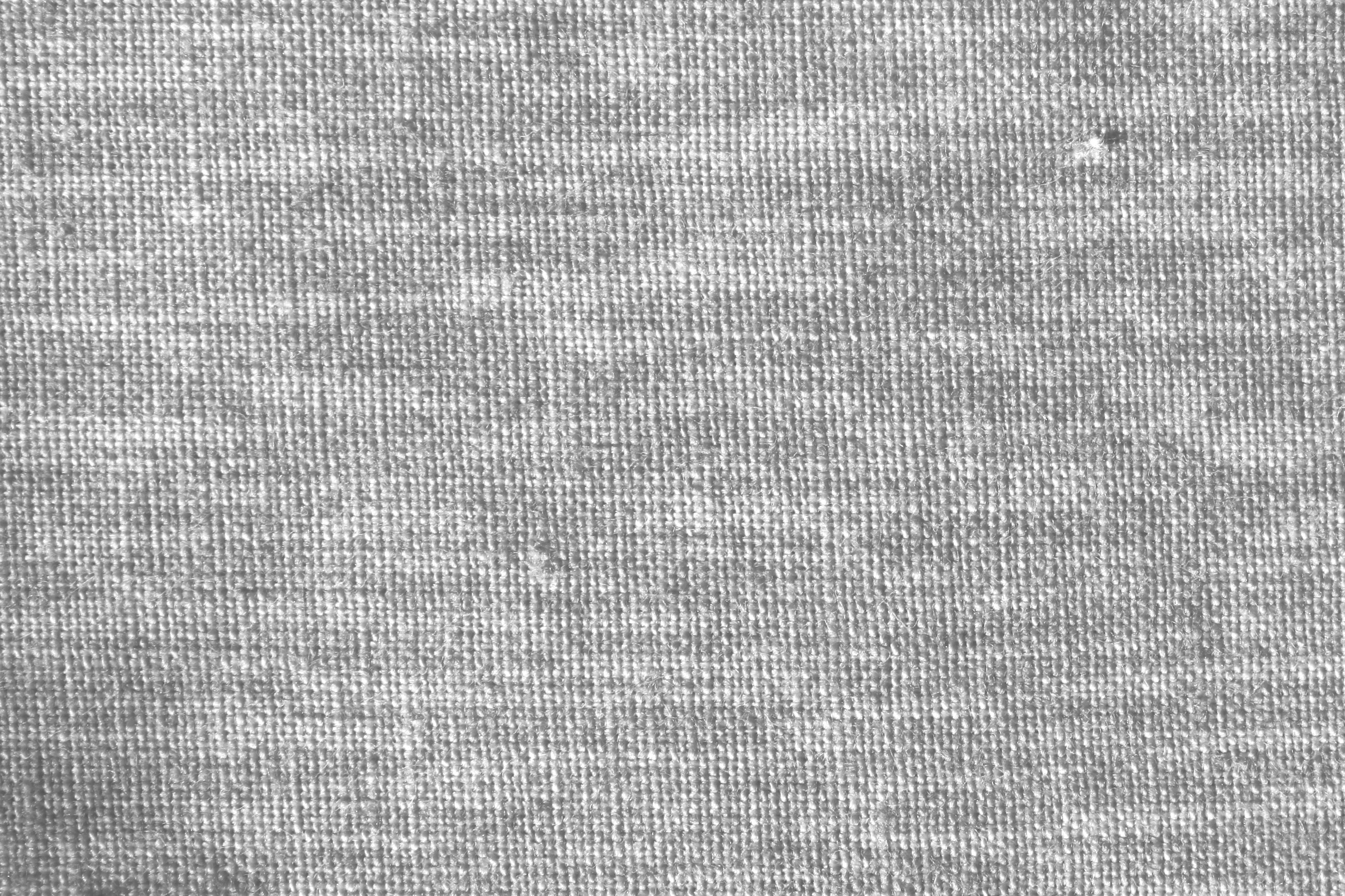 Close-up of gray fabric. Material for sewing clothes. Texture